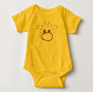 head of cute cartoon animal on a yellow baby bodysuit